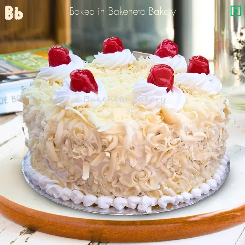 Freshly baked White Forest Cake available for online ordering and delivery in Noida, Ghaziabad.