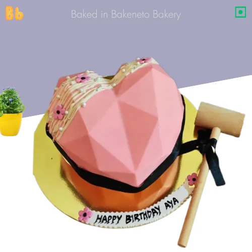 Pink Heart Pinata cake the best cake for wife's birthday or anniversary. Order cake online in noida, Indirapuram and noida extension by bakeneto.