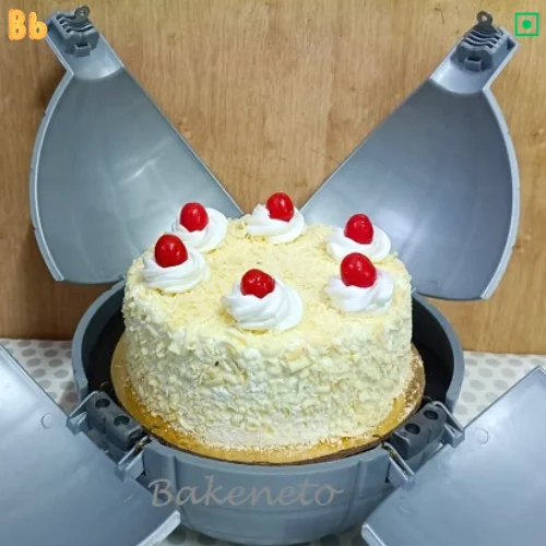 a delicious and fresh white bomb cake for birthday celebration is available for online ordering by bakeneto.com, the best bakery in Noida, Ghaziabad. You can order and send cake online to friends and family by bakeneto.